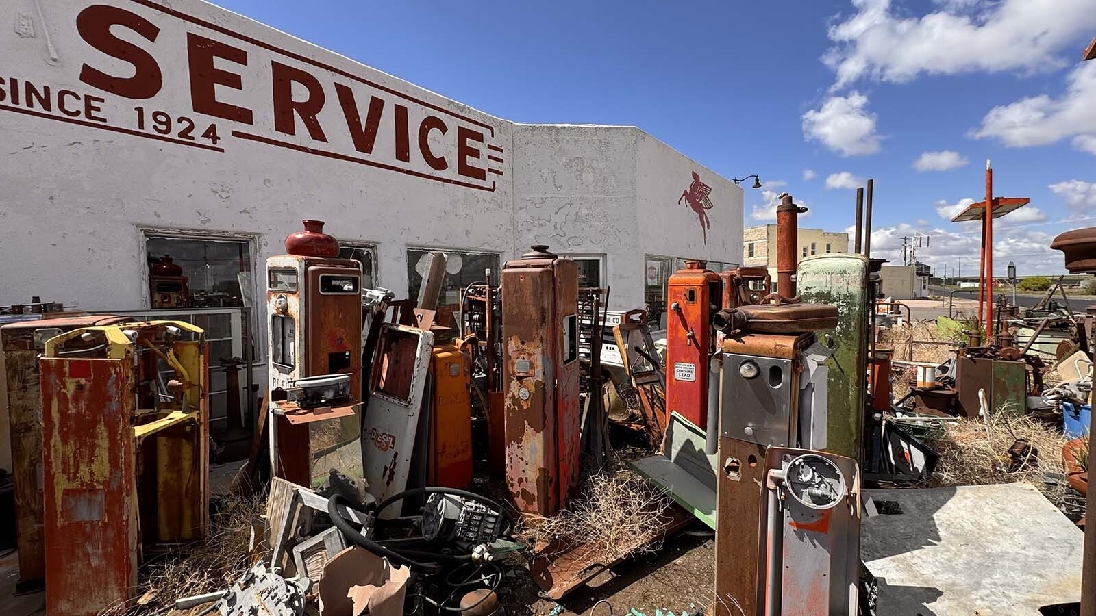 Pete’s Service along U.S. Highway 30 in Pine Buffs, Wyoming, has become a local landmark for the dozens of rusted out old gas pumps that fill up its yard. But the 101-year-old Mobil station is much more than a gas pump graveyard.